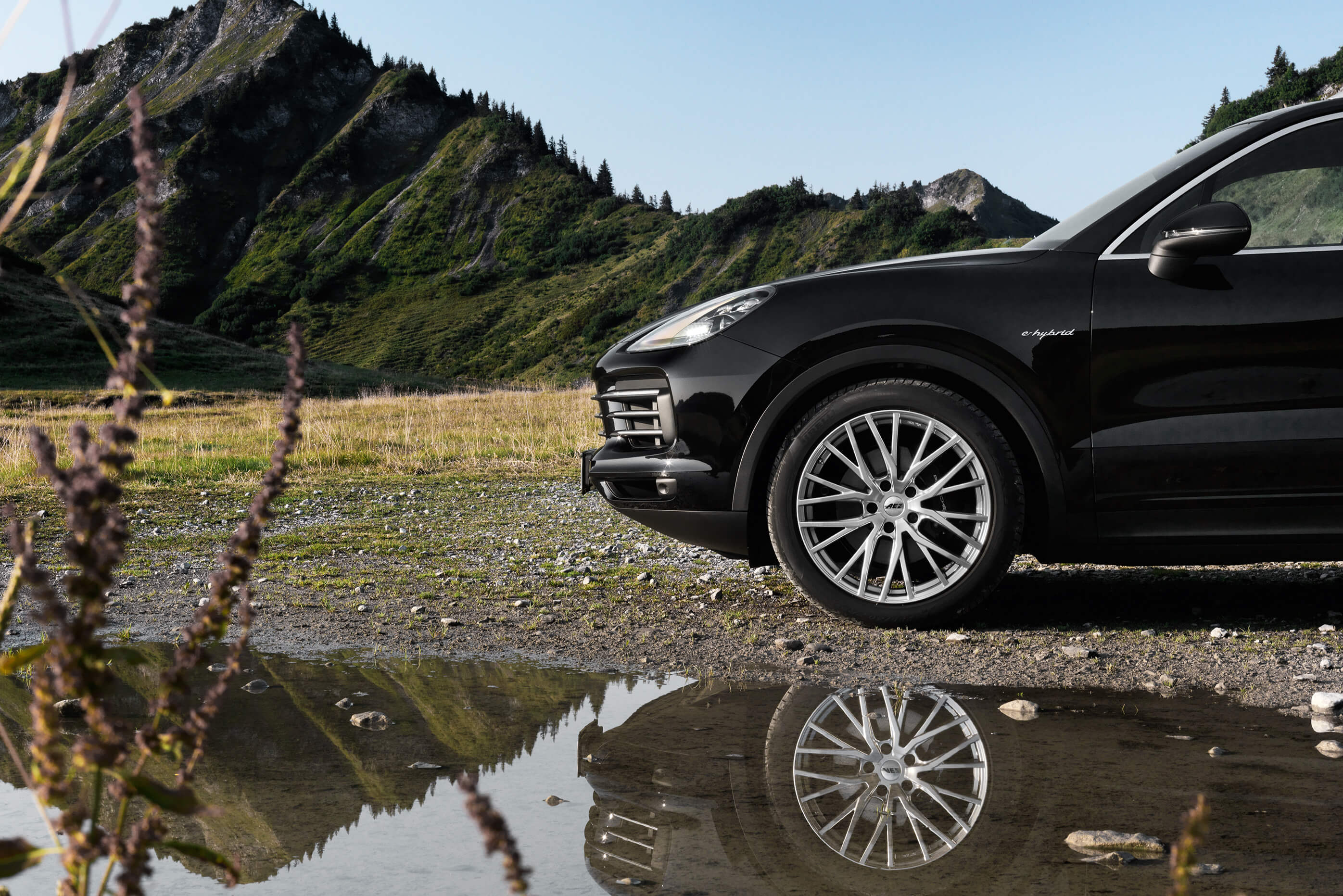 Porsche Cayenne on AEZ Panama high gloss